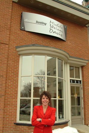 Michele in front of the Divorce Busting Center